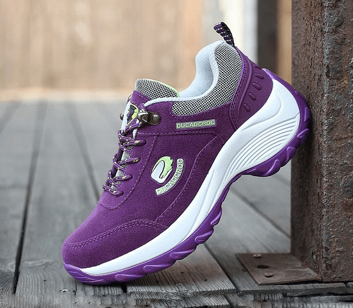 Purple sports fur women's sneakers with animal print, non-slip lace-up closure, and insulated interior for warmth and style.